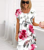 Mid-length pleated dress with ruffles and floral print for women