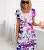 Mid-length pleated dress with ruffles and floral print for women