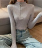 Fitted high-neck sweater for women