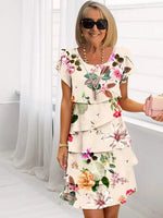Mid-length pleated dress with ruffles and floral print for women