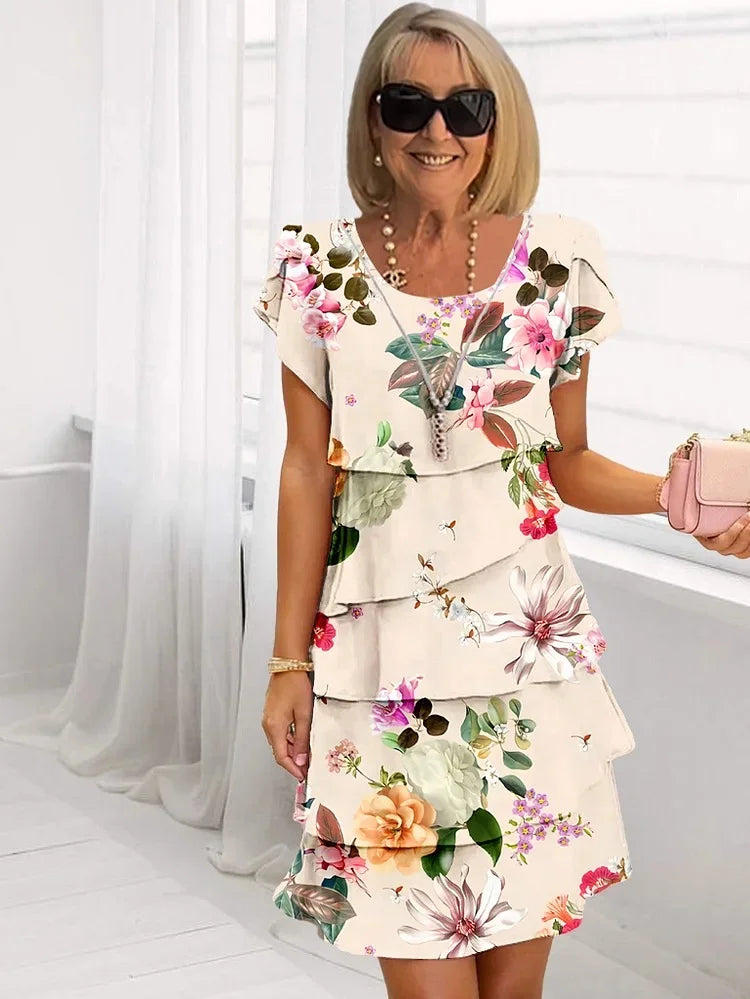 Mid-length pleated dress with ruffles and floral print for women